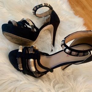 Black, white, and tan sandal with platform